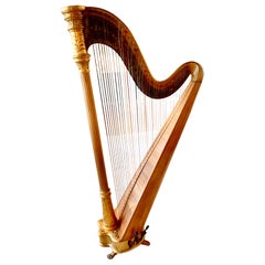 Antique parcel gilt musical harp by Lyon and Healy