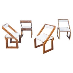 Set of four POGGIOLI design chairs in wood, briar and brass. Italy, 1970s