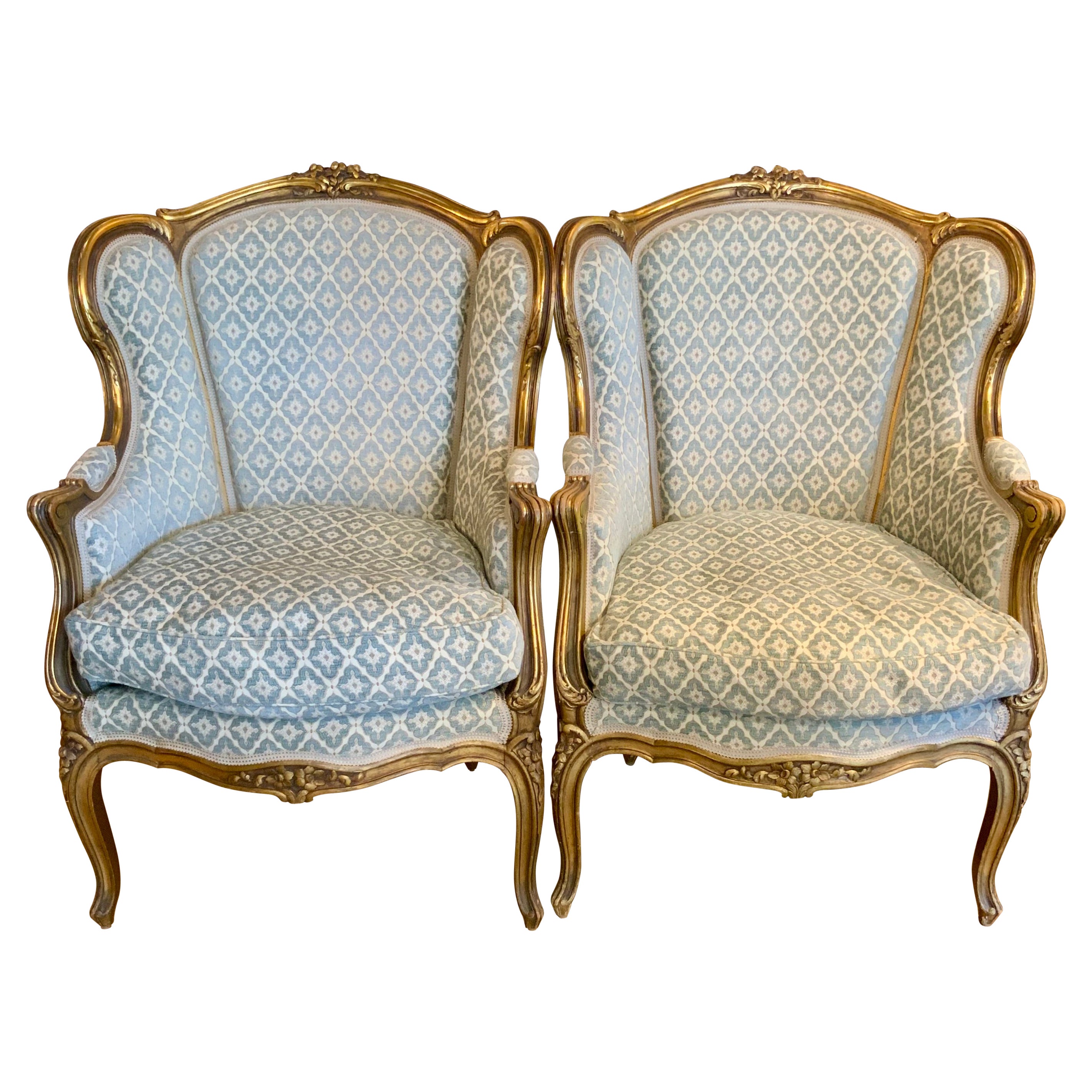 Pair of French Louis XV—Style antique giltwood bergere chairs