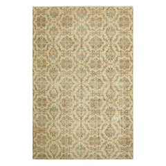 Tappeto vintage Zeki Müren in beige dorato con motivi floreali  Rug & Kilim