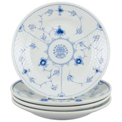 Bing & Grøndahl. Set of four Blue Fluted plates. Hotel/restaurant porcelain.