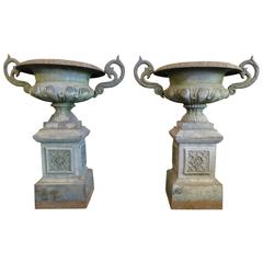 Pair of Large French Cast Iron Urns on Plinths 