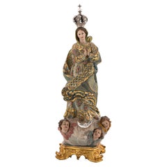 Immaculate Conception. Wood, glass, silver. Portuguese school, 18th century.