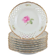 Meissen, Germany. Set of seight "Pink Rose" reticulated plates. Approx. 1930s