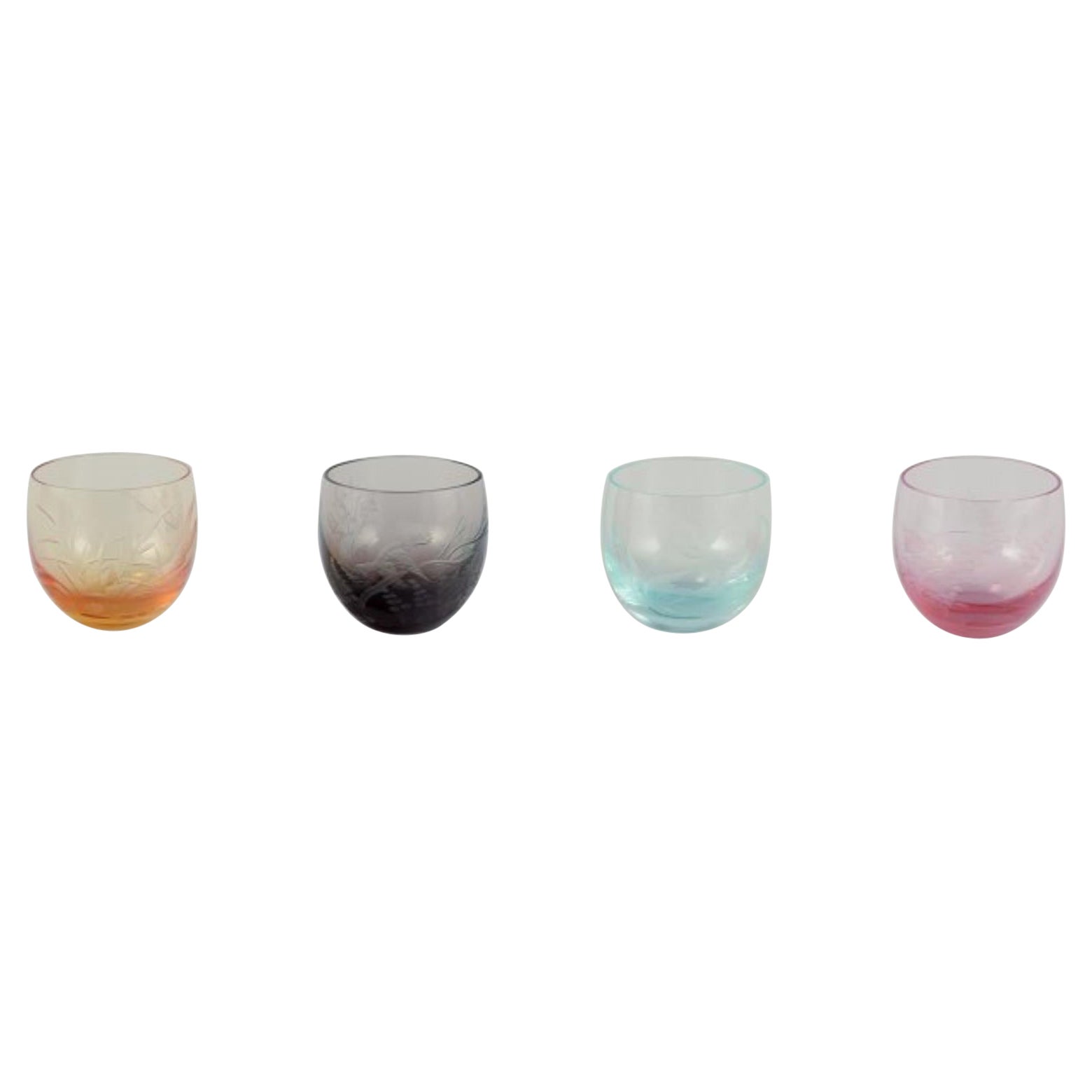 Moser, Karlsbad, Czech Republic. Set of four colored vodka glasses.