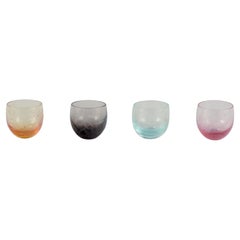 Moser, Karlsbad, Czech Republic. Set of four colored vodka glasses.