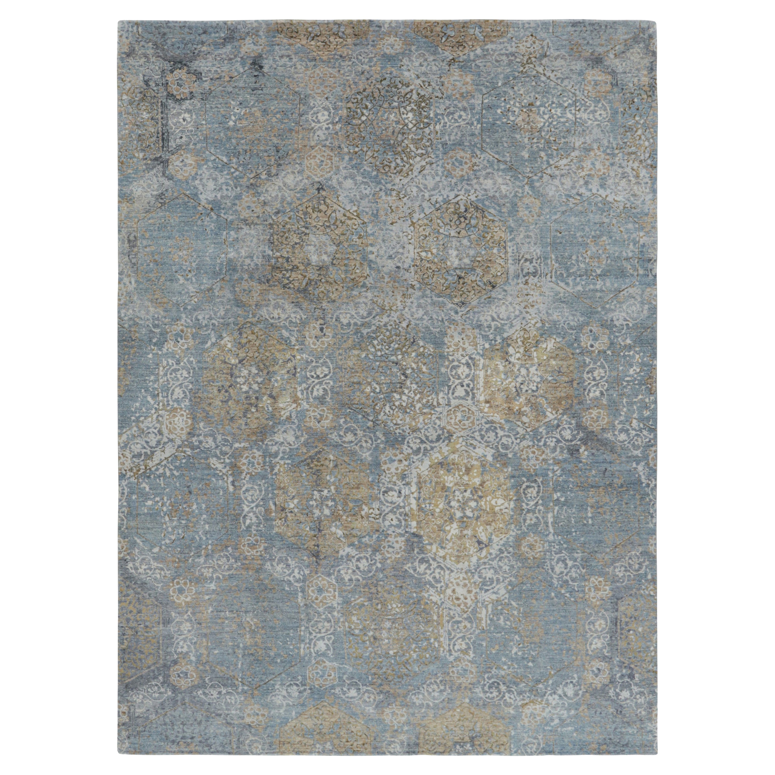 Alfombra Modern Classics de Rug & Kilim en azul con medallones beige-marrón