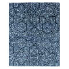Alfombra Modern Classics de Rug & Kilim con motivos florales azules en medallones de estrellas