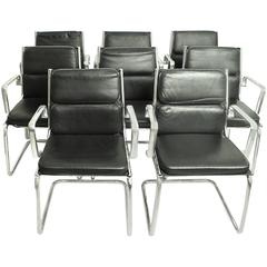 Vintage Eight Black Leather Office Chairs in the Style of the Soft Pad Chair by Eames