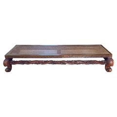 A Victorian Walnut Caned Low Bench/Dog Bed, circa 1900