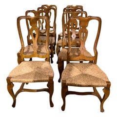 Set of 8 country style dining chairs with rush seats in honey color