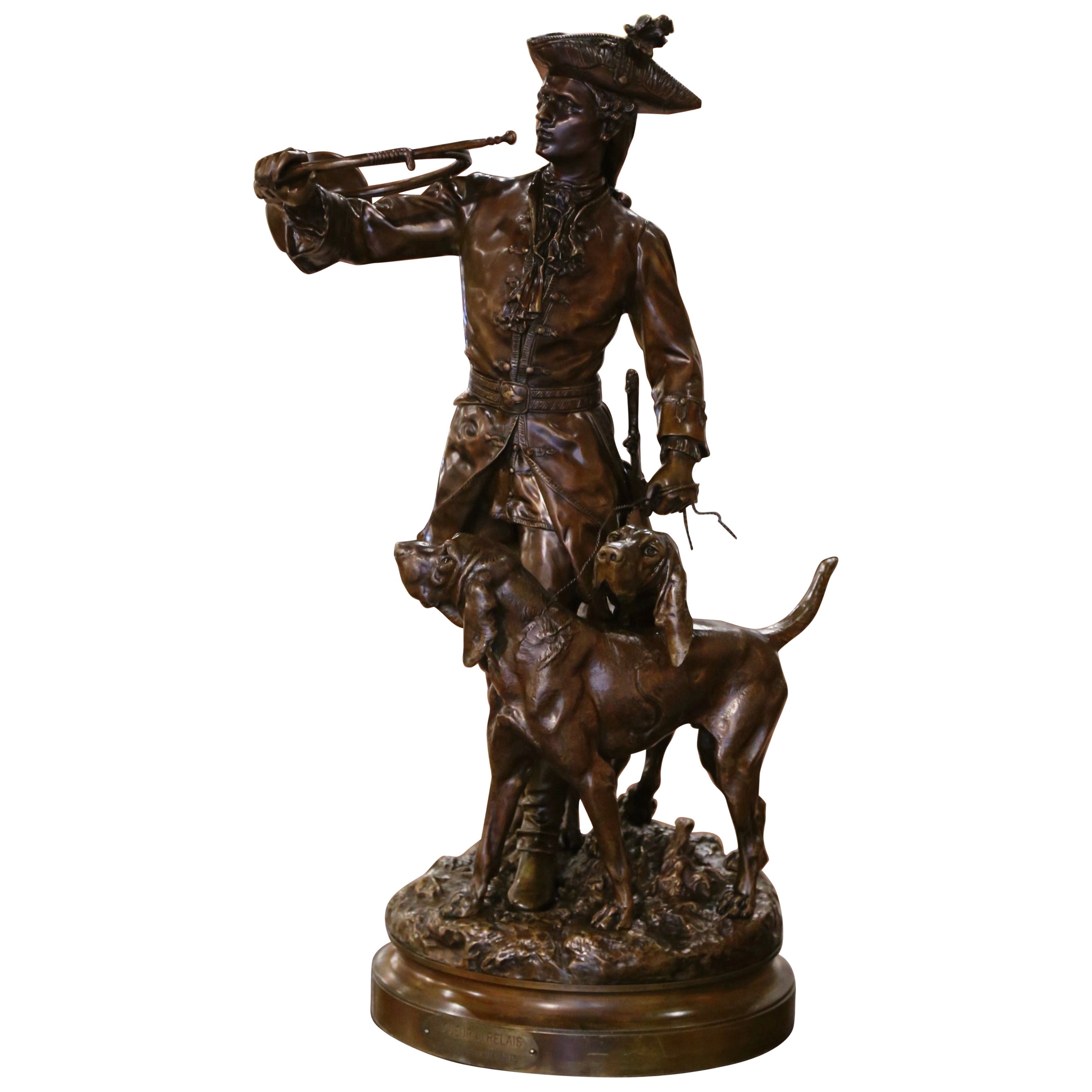Composition de chasseurs et de chiens en bronze patiné du 19e siècle signée H. Moreau