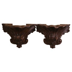 Paar geschnitzte Wandkonsolen aus Nussbaumholz des 19. Jahrhunderts aus der Provence, Louis XV