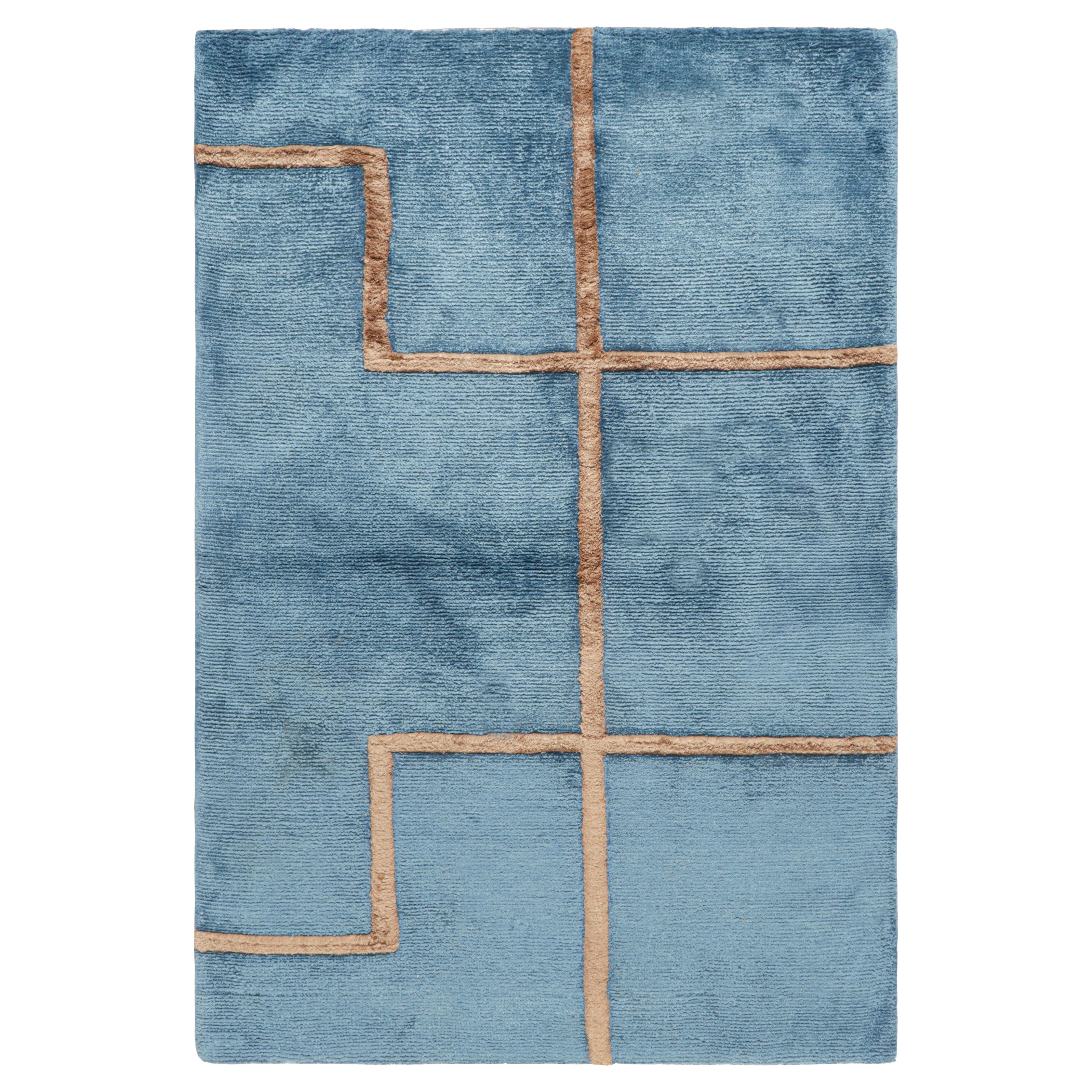 Muestra de alfombra moderna a medida de Rug & Kilim en azul y marrón con motivos geométricos