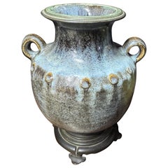 A bronze and ceramic vase circa 1900