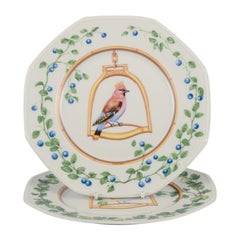 Hermès, Francia. Dos platos de porcelana con motivos de pájaros. Finales del siglo XX