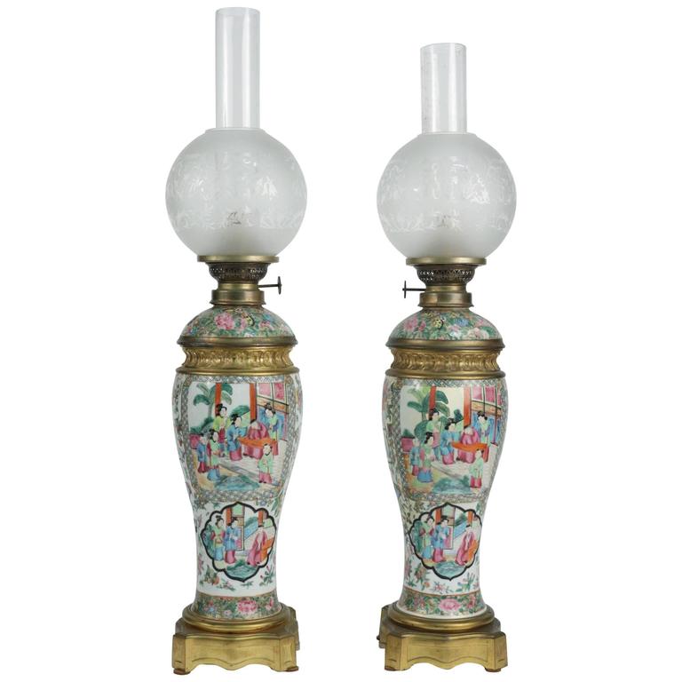 Pair Of Chinese 19th Century Oil Lamps In Porcelain And Gold Gilt Pair Of Chinese 19th Century Oil Lamps In Porcelain And Gold Gilt Bronze For