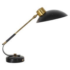 Parisian Brass and Black Enameled Desk Lamp by Ferdinand Solère, 1950