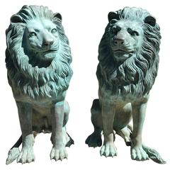 Magnificent Pair of Patinated Bronze Lion Sculptures