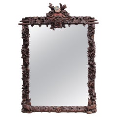 Antique A Large 1880s Hand Carved Black Forest Mirror
