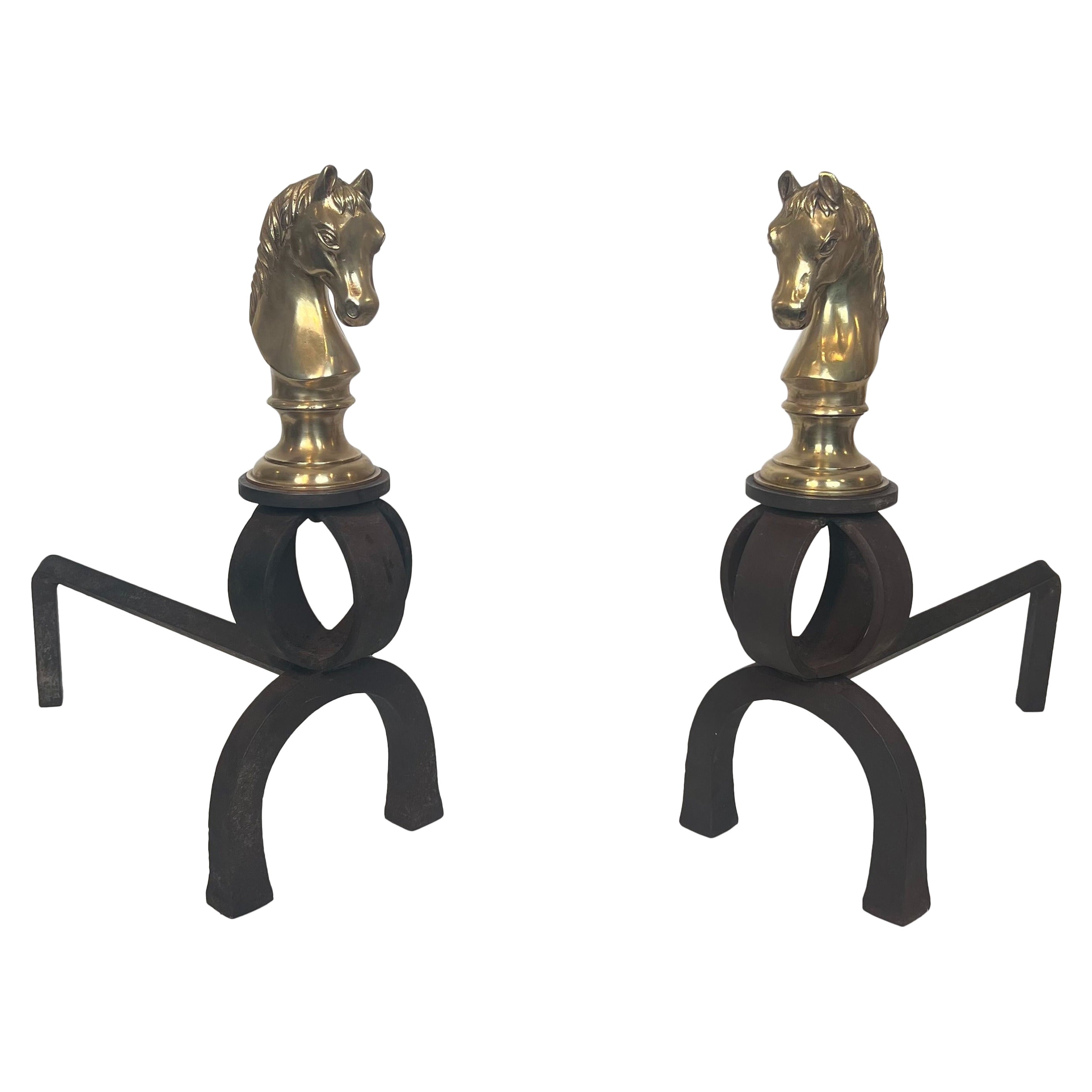 Importante paire de chenets en bronze et fer forgé représentant des têtes de chevaux
