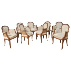 Set of eight walnut dining chairs