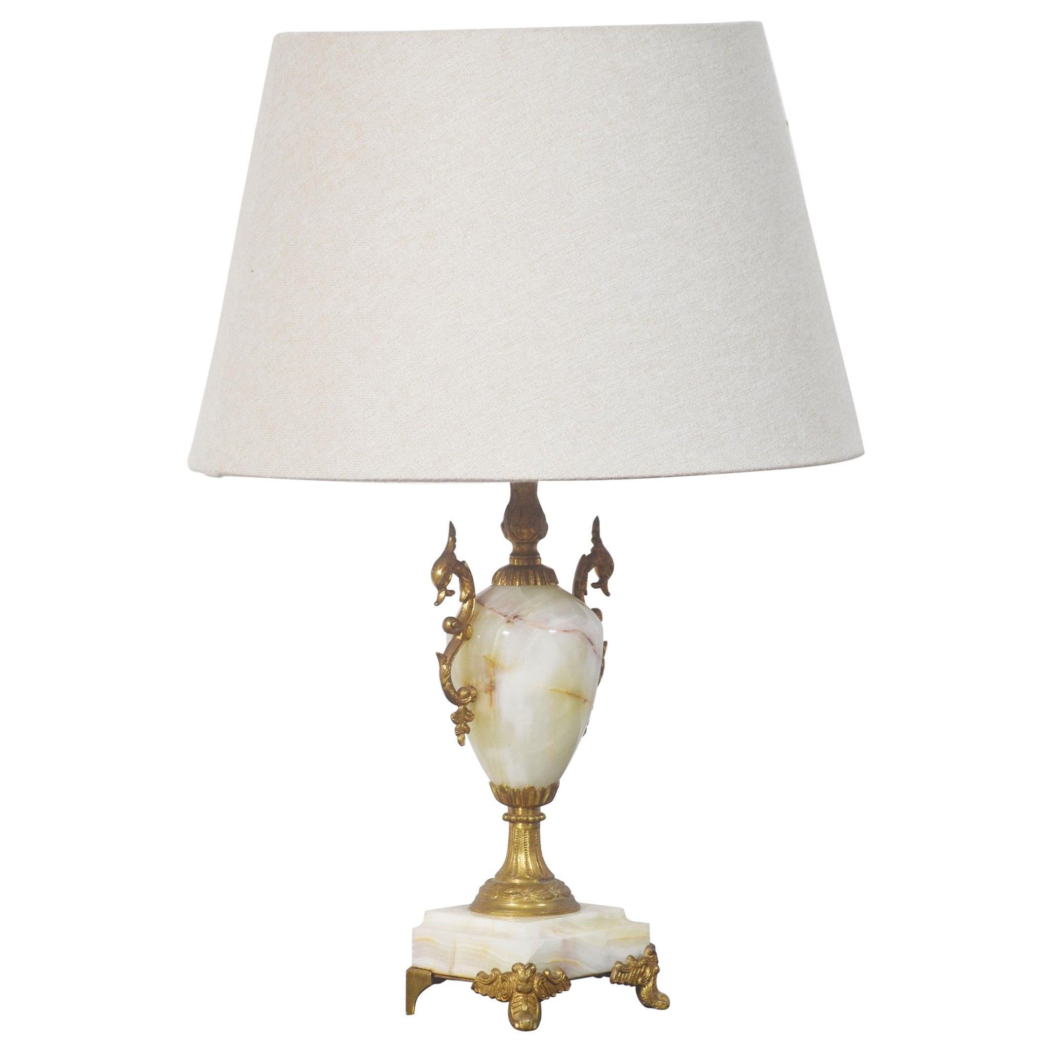 Metal mounted onyx table lamp