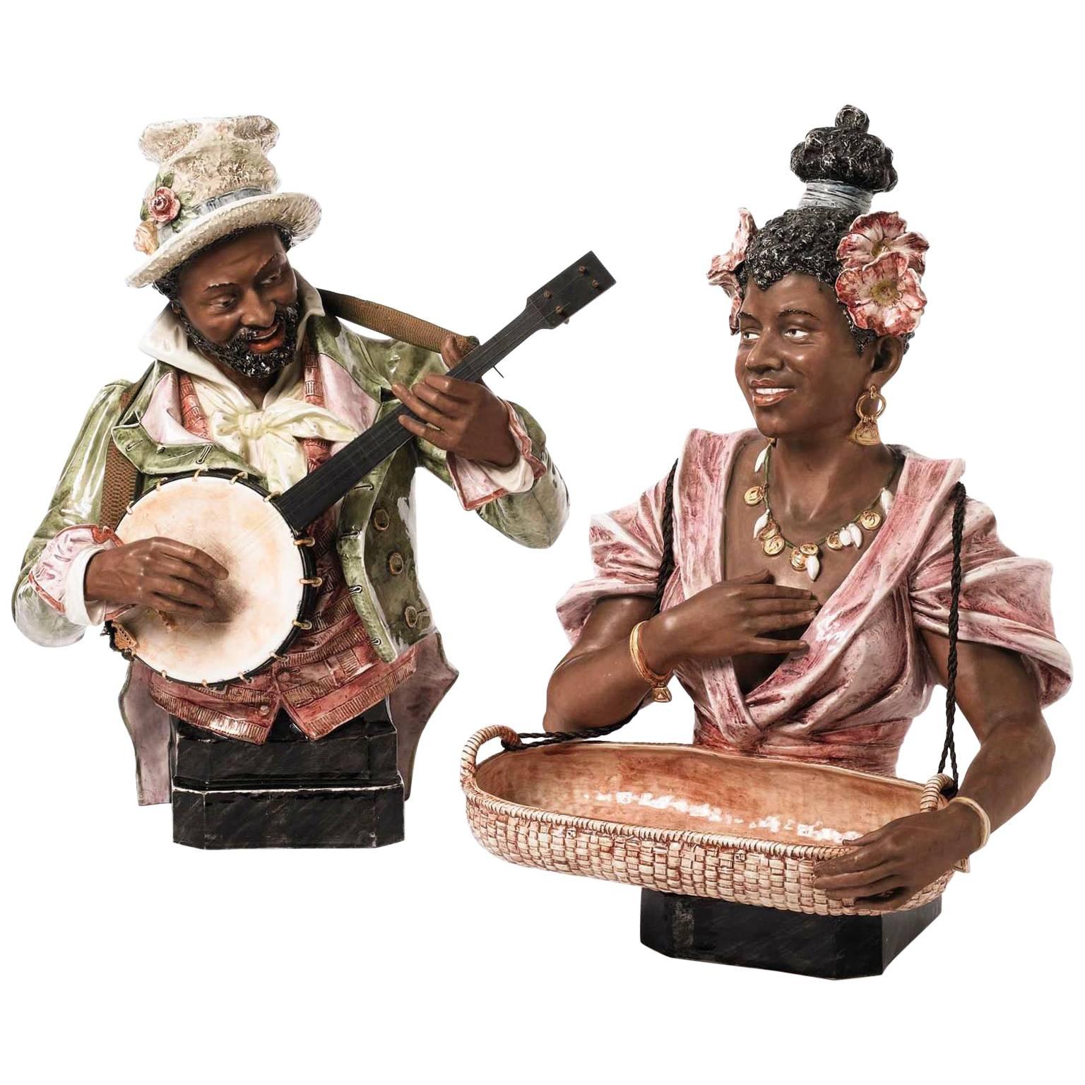 Pair 19th-20th Century Majolica Busts of "the Banjo Player and the Flower Lady"