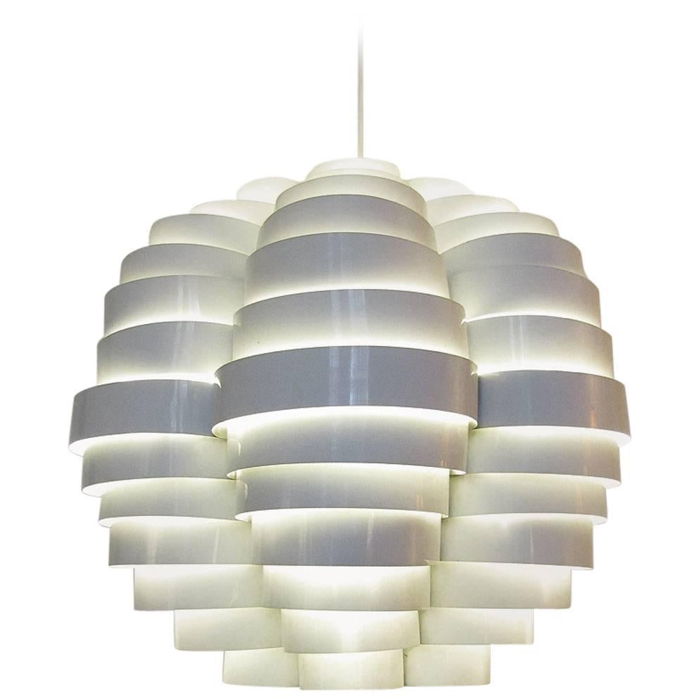 A large model 1770 "Tornado" ceiling light by Elio Martinelli for Martinelli Luce.

Italian designer Elio Martinelli created exceptional lamps such as the Cobra and Serpente. The Tornado is one of his rarer ceiling lights.

This light