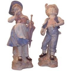 Pair of Porcelain Figures of Boy and Girl