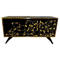Buffet moderno di design italiano laccato nero e in ottone dorato