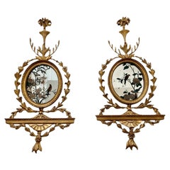 Antique Pair of George III girandole mirrors with eglomise birds - sconces