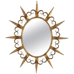 Oval Sunburst Mirror in Gilt Iron with Eyelash Details, Spain 1950s