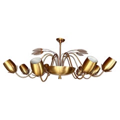 1950 Paavo Tynell pour Lightolier Lustre à huit lumières en laiton Tulip