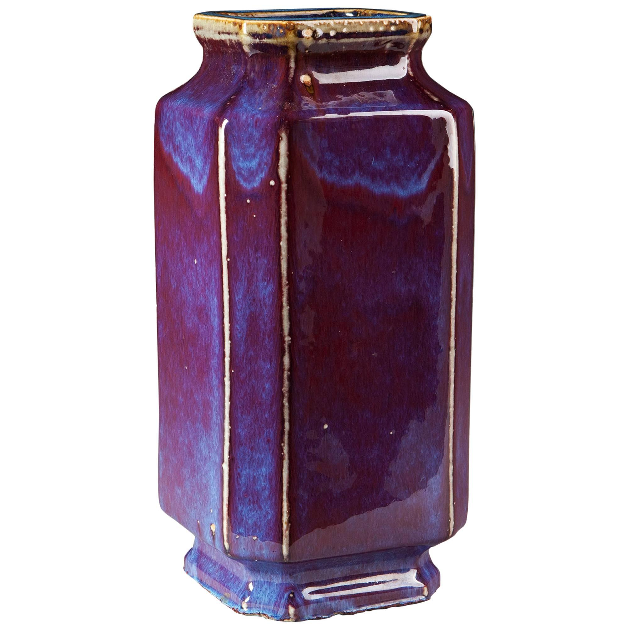 An early 20th century purple flambé vase of octagonal form, now mounted as a lamp.