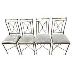 Set di quattro sedie in acciaio e ottone di Alberto Orlandi, in stile Mid Century Modern.