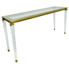 Konsolentisch aus Lucite und Messing mit Glasplatte nach Charles Hollis Jones.