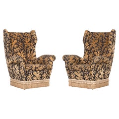Pair of armchairs by Melchiorre Bega, 1940s