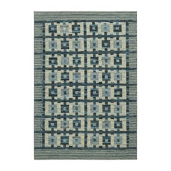 Alfombra de estilo escandinavo de Rug & Kilim en azul y crema con motivos geométricos