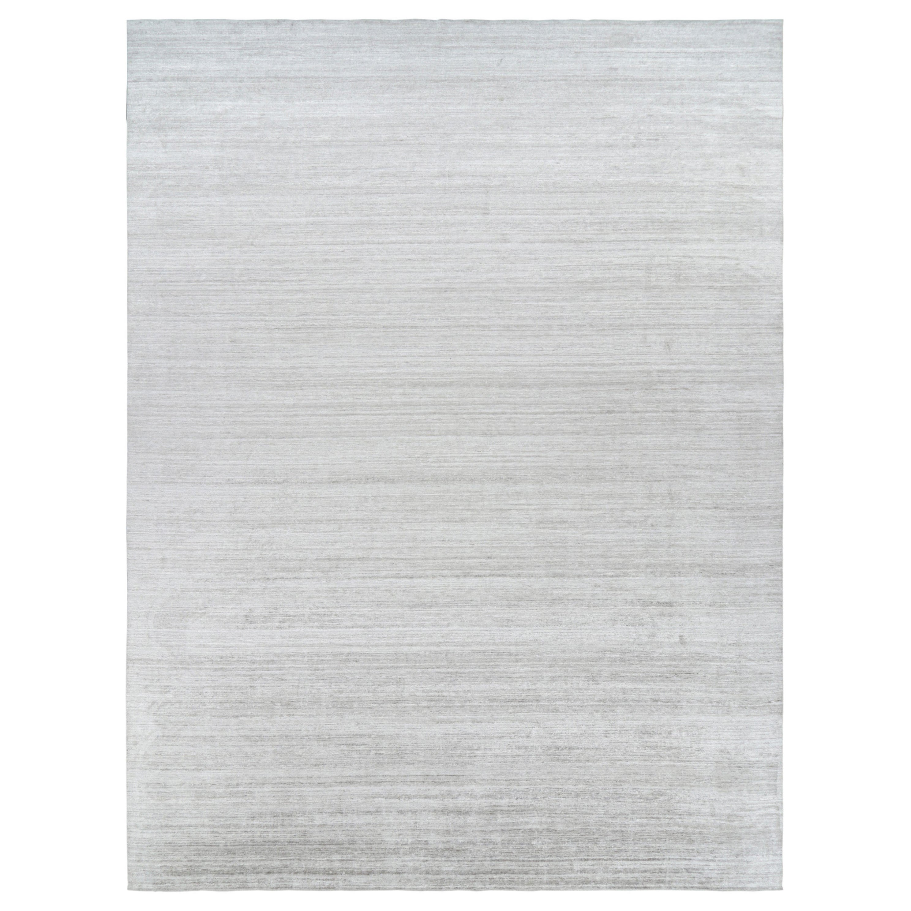 Alfombra de textura sobredimensionada de Rug & Kilim en gris sólido y rayas blanco roto