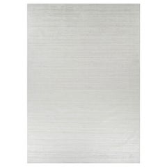 Rug & Kilim’s Oversized Textural Rug In Solid White, Gray and Cream Striae