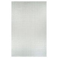 Rug & Kilim’s Oversized Textural Rug In Solid White and Silver-Gray Striae