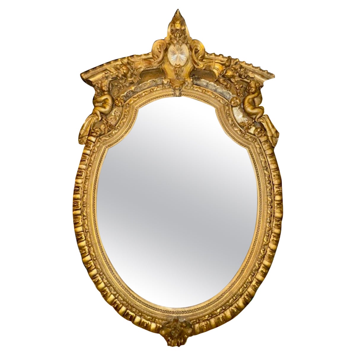 19th Century French Louis XVI Style Carved and Giltwood Oval Mirror