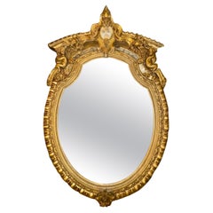 19th Century French Louis XVI Style Carved and Giltwood Oval Mirror