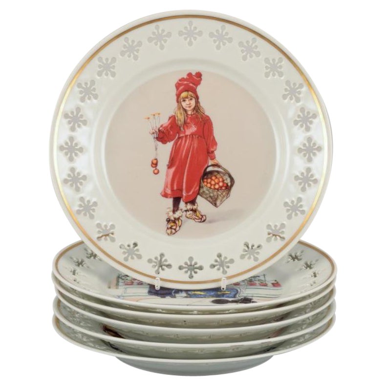 Bing & Grøndahl. Six porcelain plates with motifs from Carl Larssons paintings. For Sale