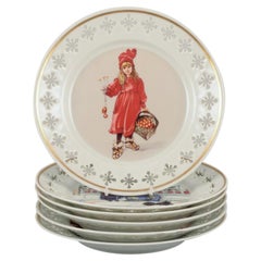 Bing & Grøndahl. Six porcelain plates with motifs from Carl Larssons paintings.