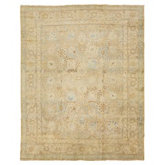Alfombra persa antigua Tabriz de lana beige con motivos florales de los años 20