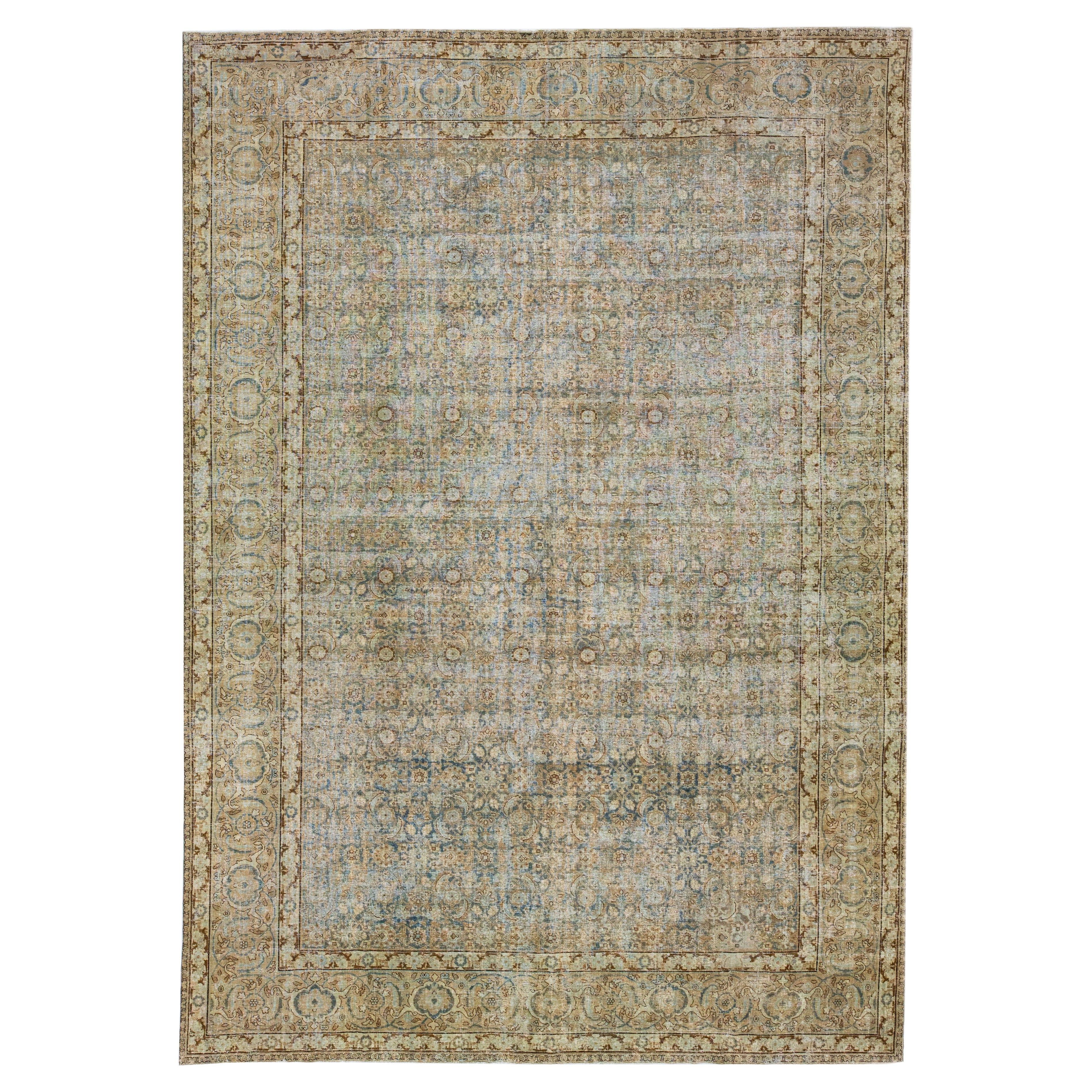 Tappeto di lana Tabriz persiano antico del 1900 con motivi floreali