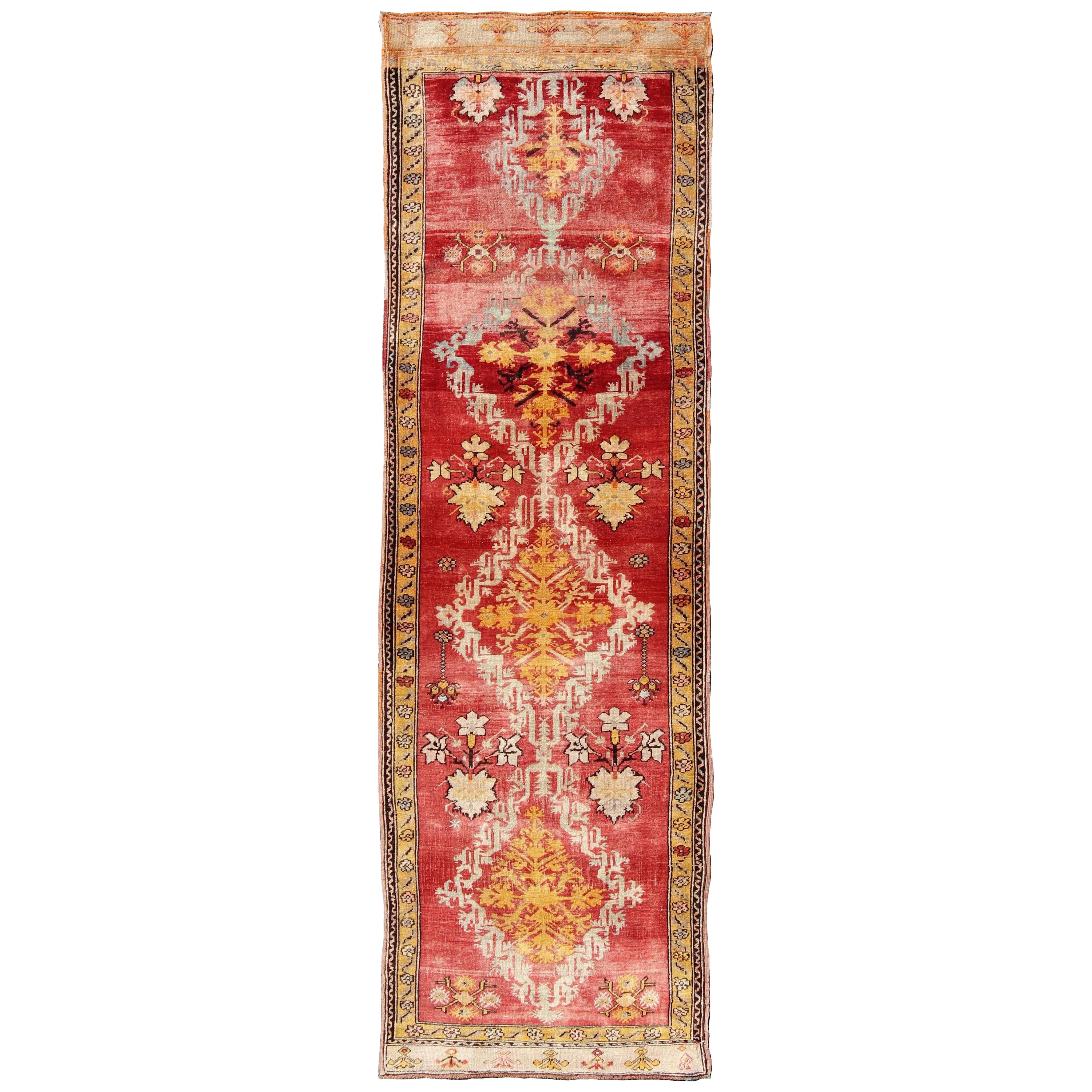 Antique Turkish Oushak Runner with Tribal Medallions in Red, Orange, and Yellow