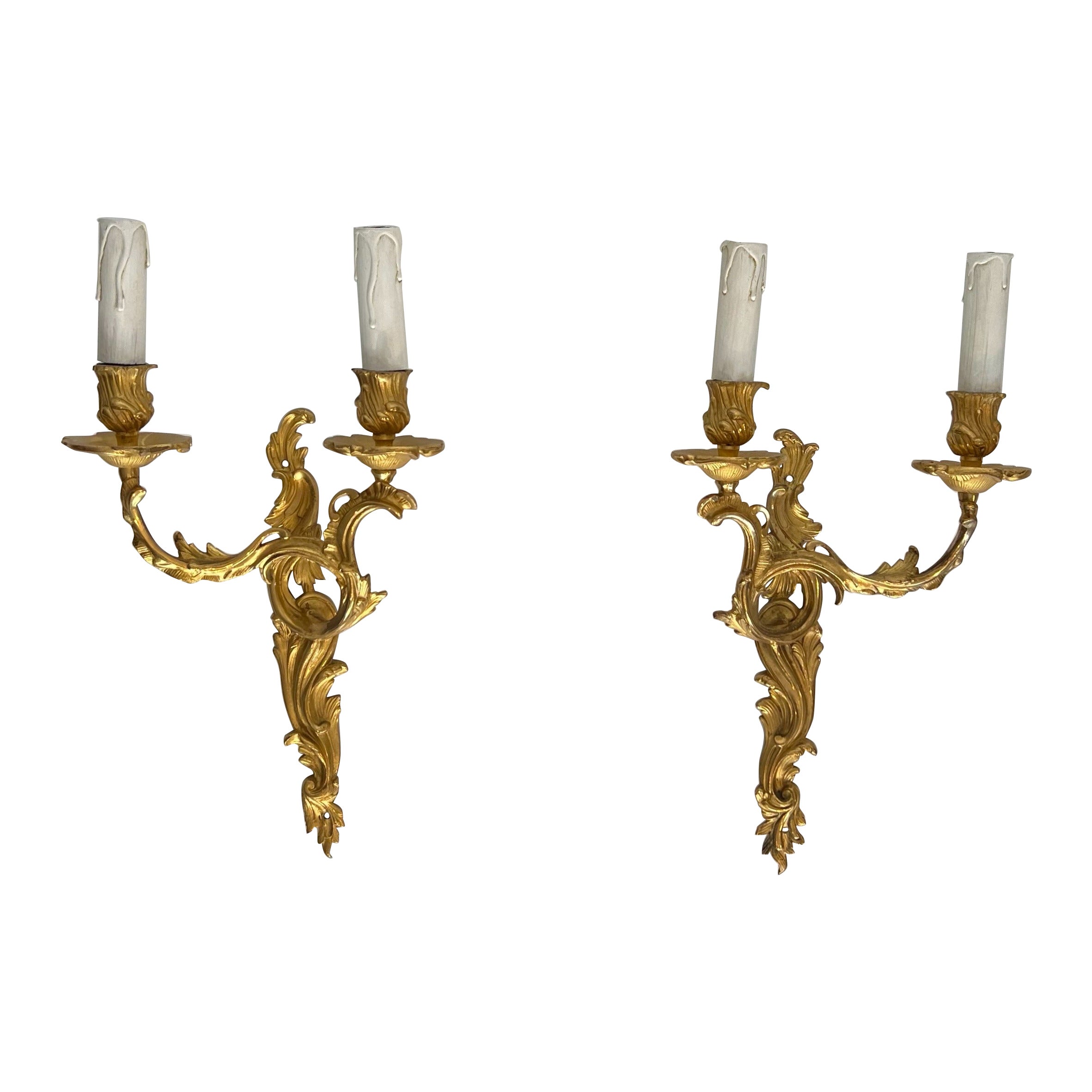 Coppia di sconsigliere in bronzo dorato in stile Luigi XV